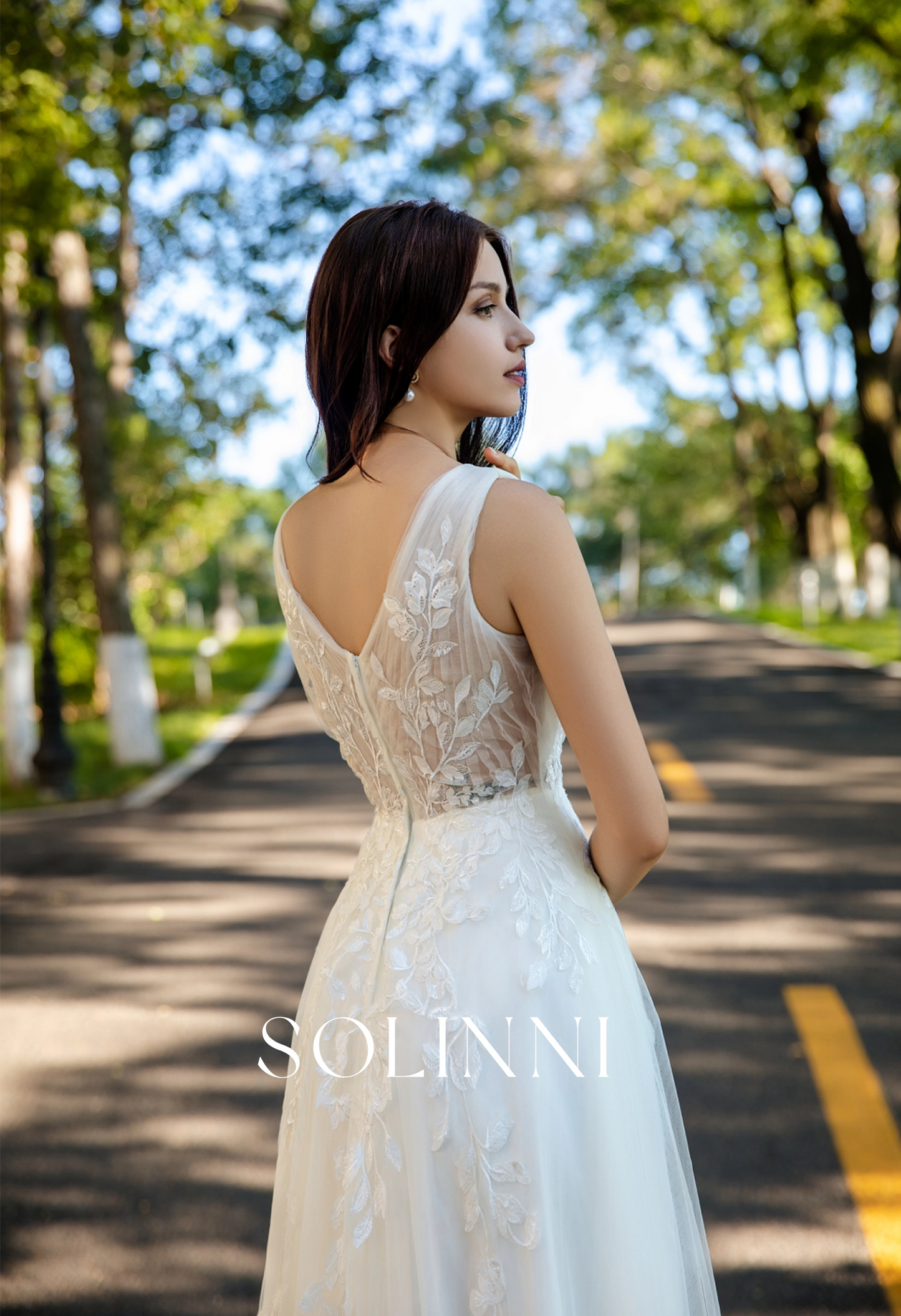 Effortless Grace Wedding Gown with V-Neckline and Ruched Bodice