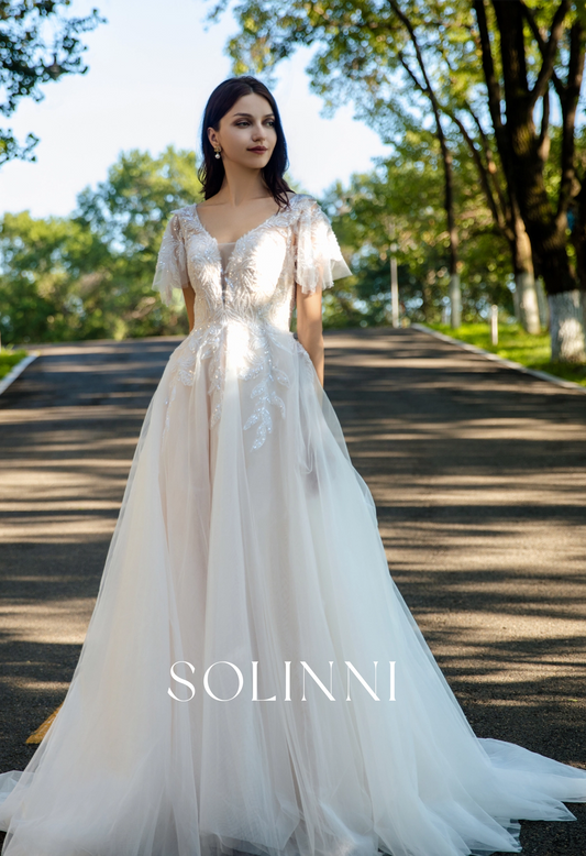 Graceful A-Line Tulle Wedding Dress with Delicate Lace and Removable Sleeves