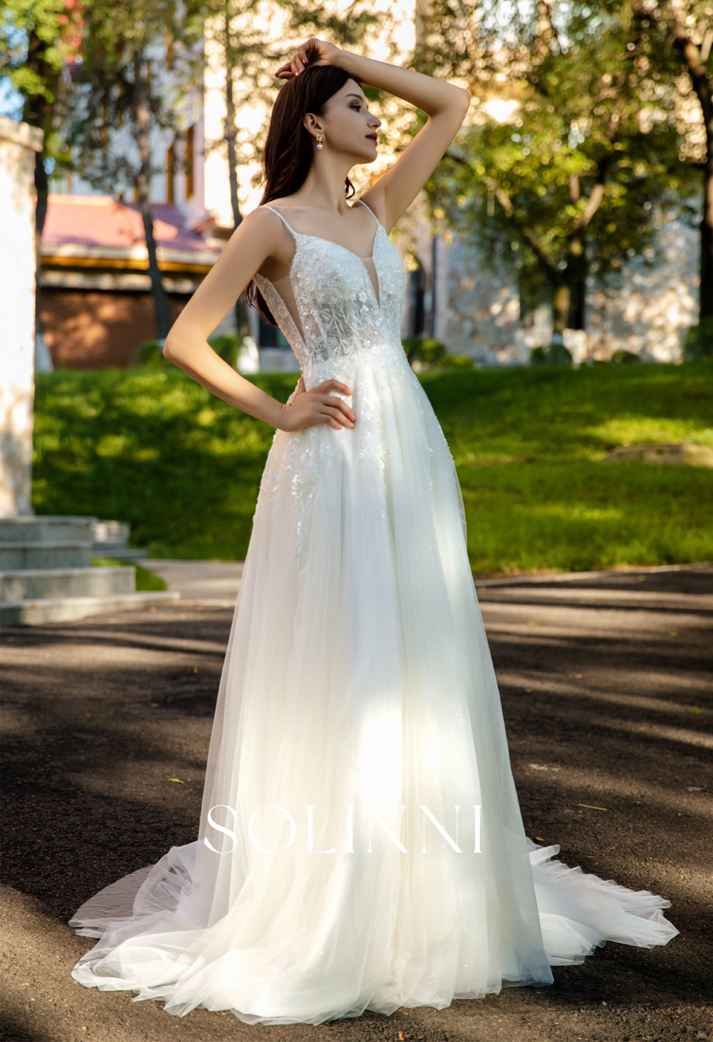 Sparkling Tulle Bridal Gown with Intricate Lace and Elegant Slit