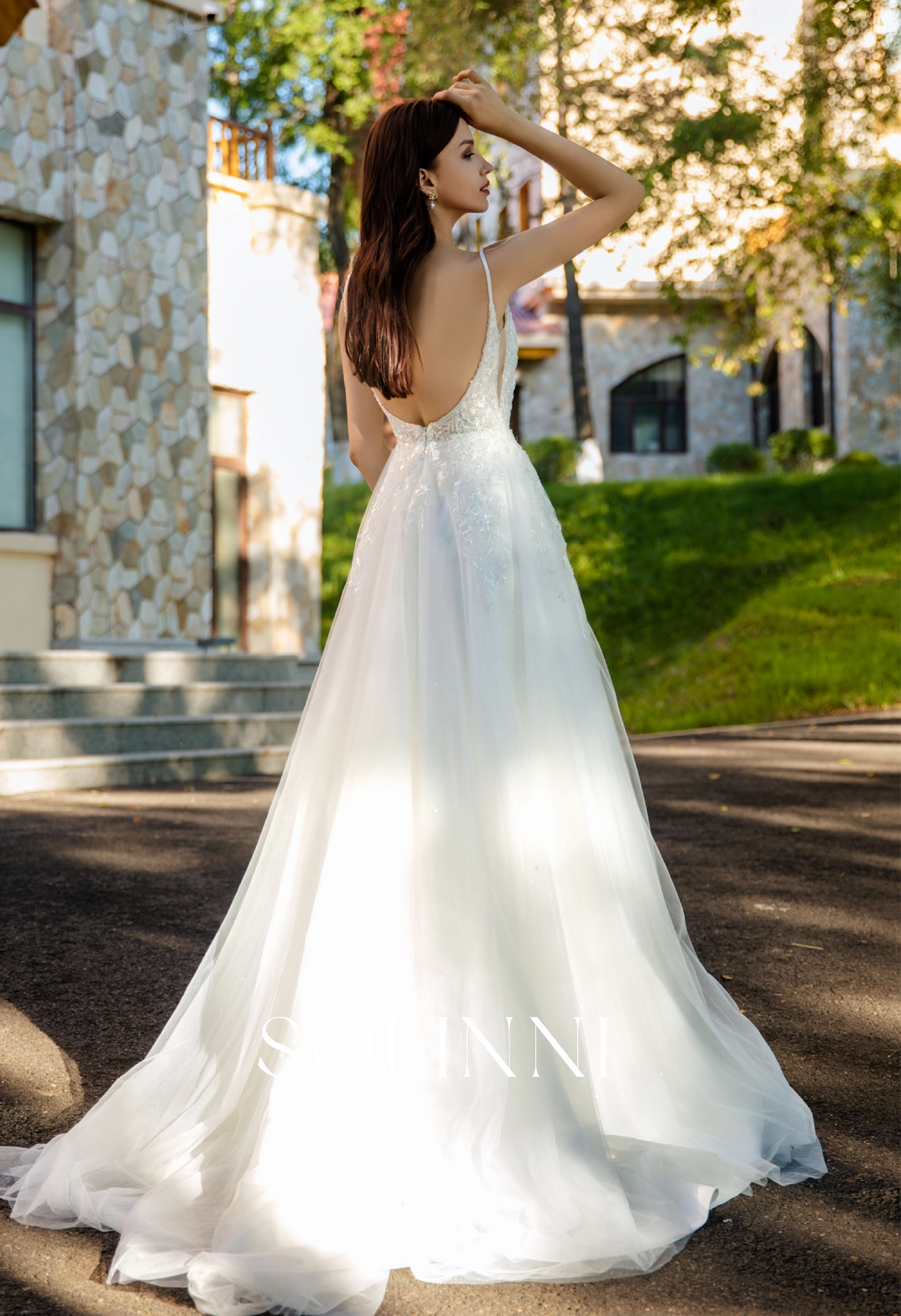 Sparkling Tulle Bridal Gown with Intricate Lace and Elegant Slit