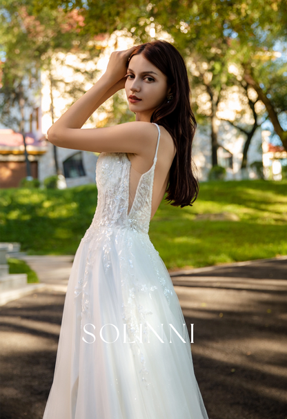 Sparkling Tulle Bridal Gown with Intricate Lace and Elegant Slit