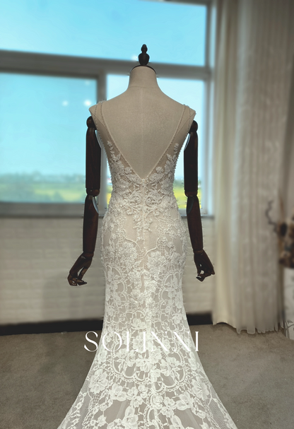 Intricate Lace Wedding Gown with Dramatic Train