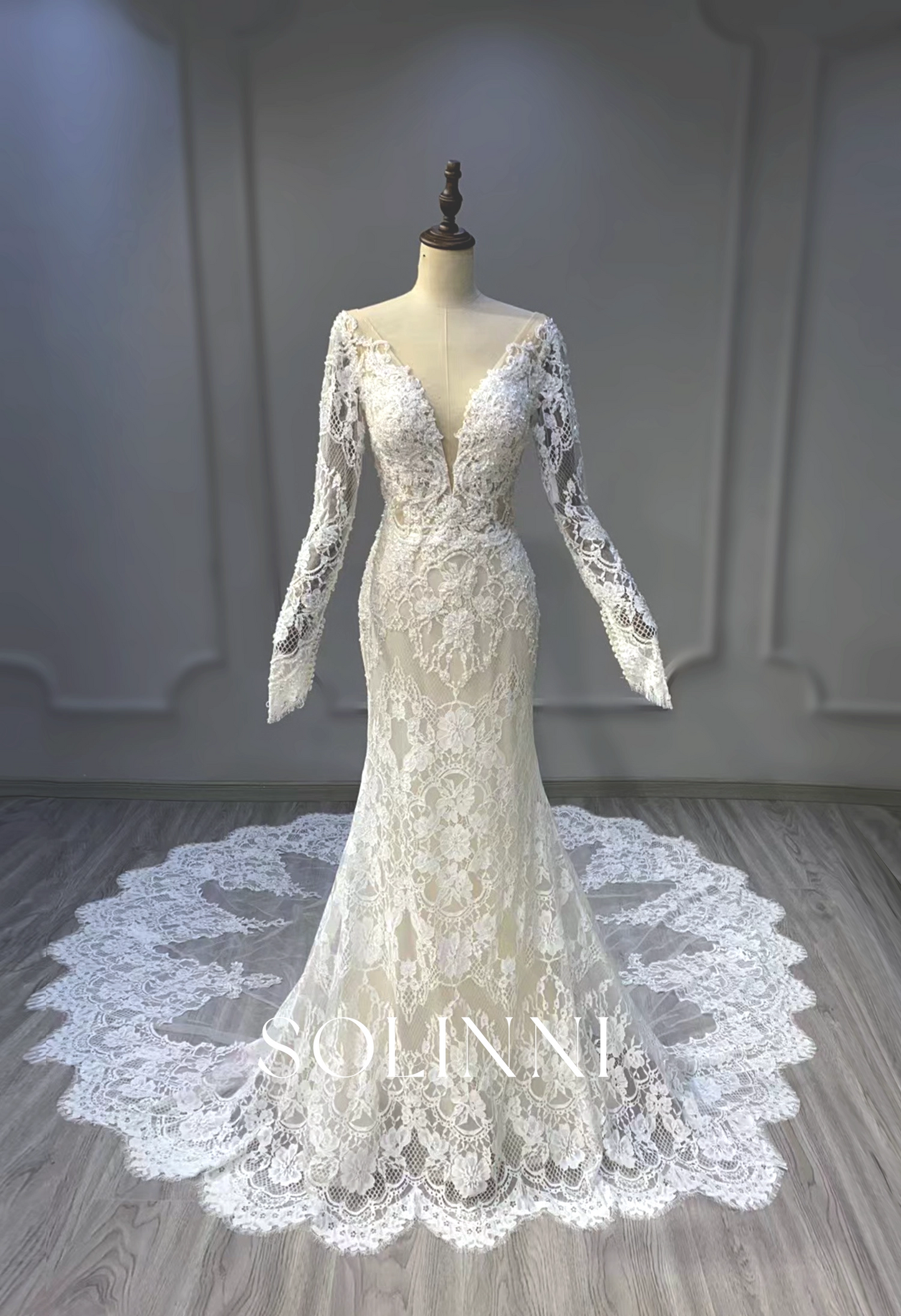 Intricate Lace Wedding Gown with Dramatic Train