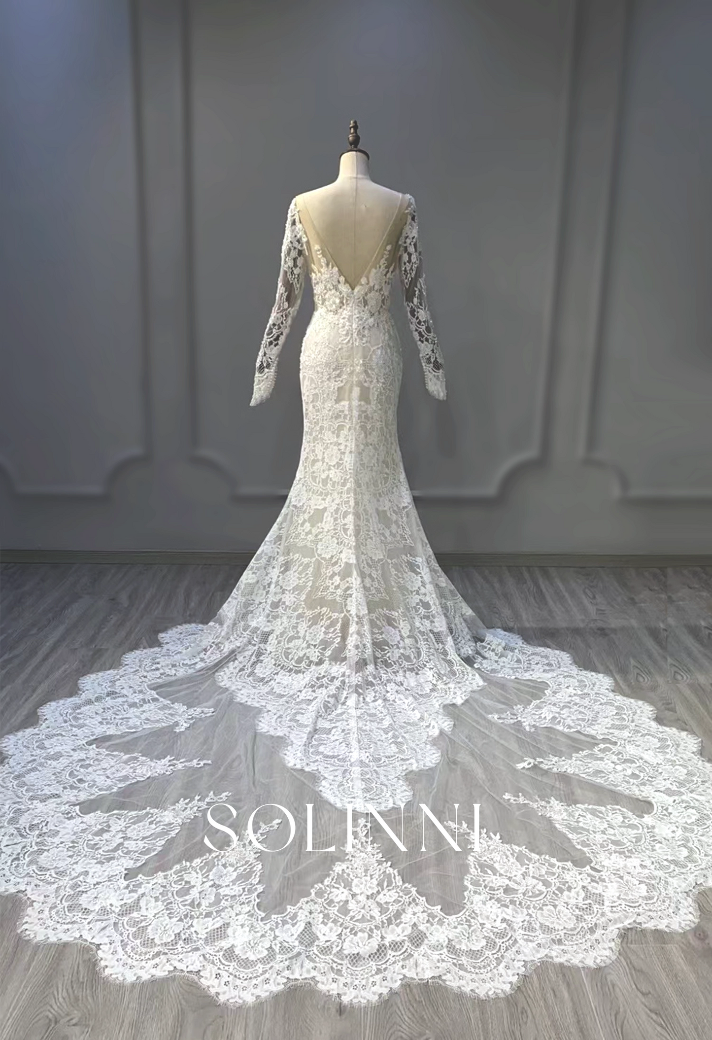 Intricate Lace Wedding Gown with Dramatic Train