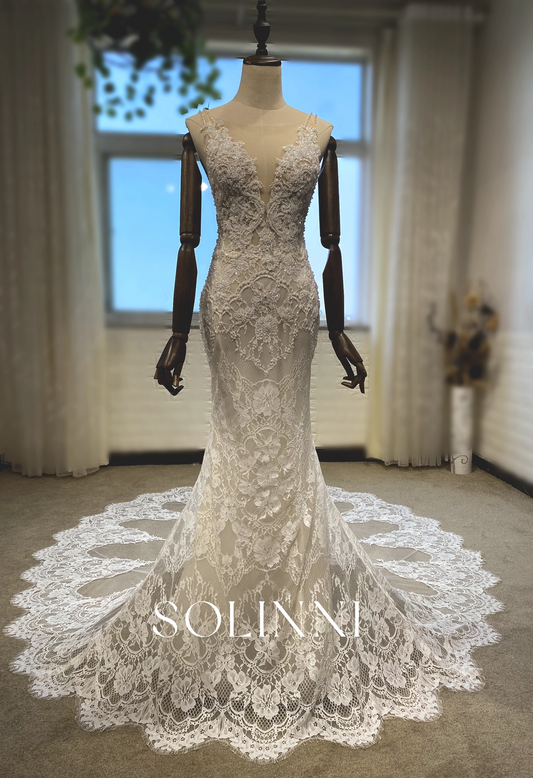 Intricate Lace Wedding Gown with Dramatic Train