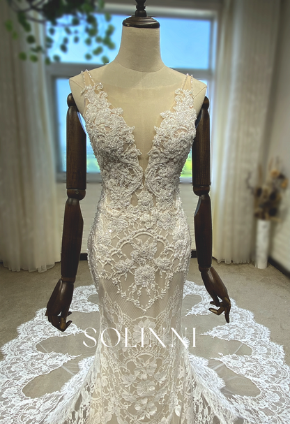 Intricate Lace Wedding Gown with Dramatic Train