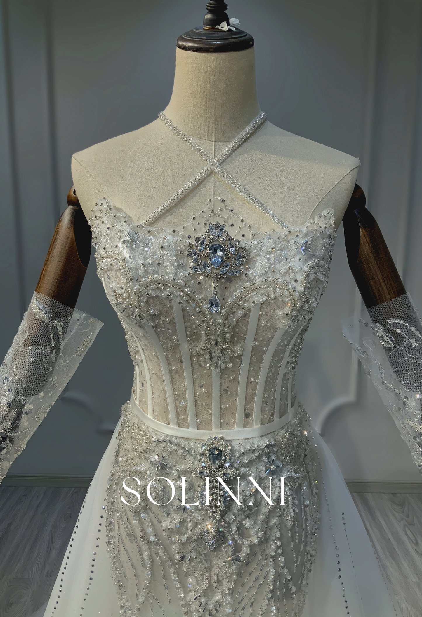 Dazzling Beaded Wedding Gown with Intricate Embroidery and Sheer Detailing