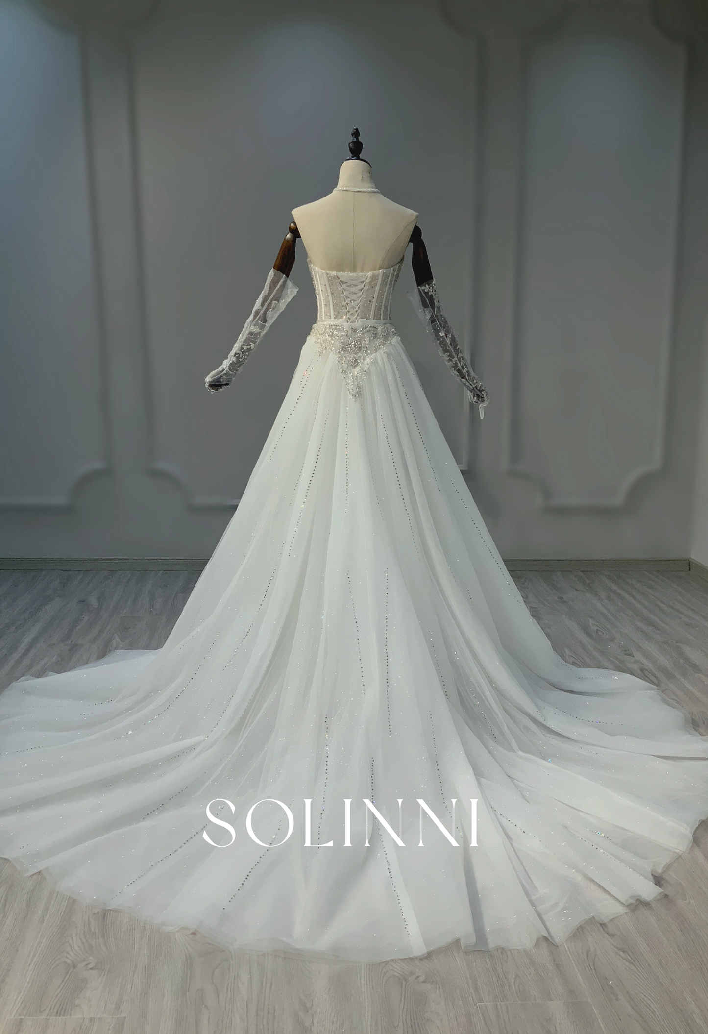 Dazzling Beaded Wedding Gown with Intricate Embroidery and Sheer Detailing
