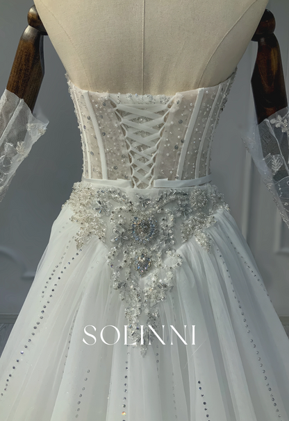 Dazzling Beaded Wedding Gown with Intricate Embroidery and Sheer Detailing