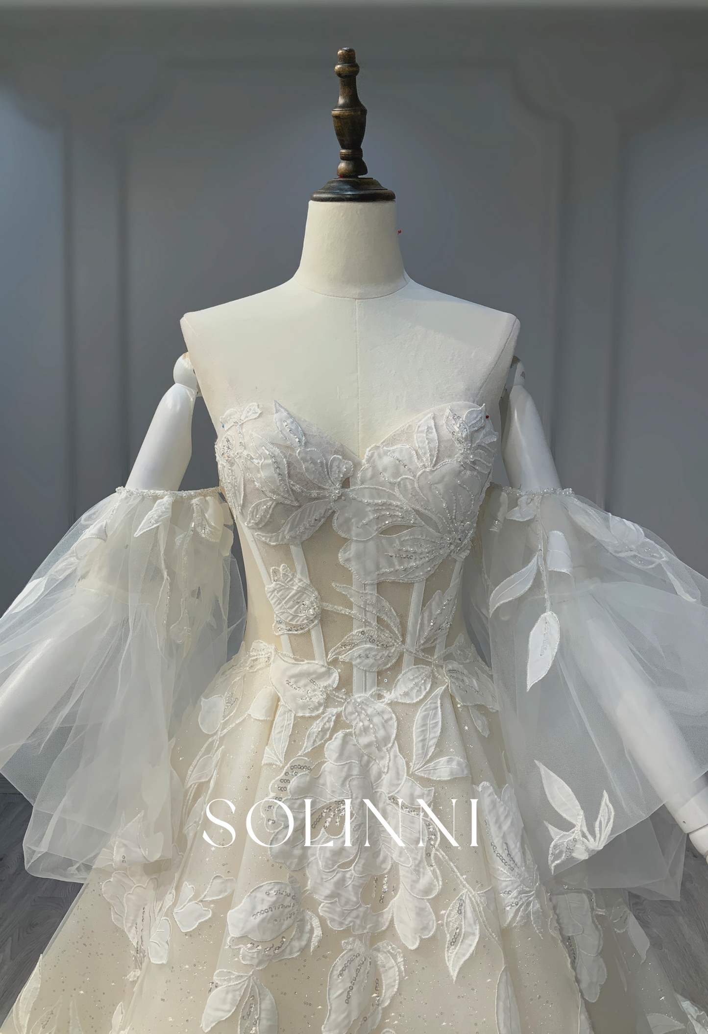 Corset Bridal Gown with Dramatic Tulle Sleeves and Floral Appliqués
