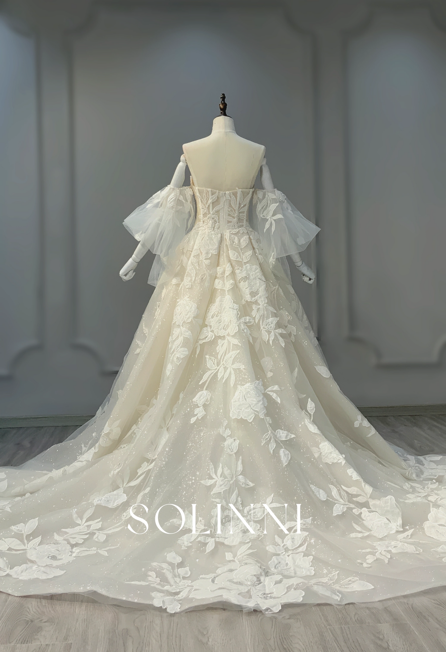 Corset Bridal Gown with Dramatic Tulle Sleeves and Floral Appliqués