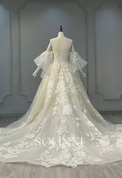 Corset Bridal Gown with Dramatic Tulle Sleeves and Floral Appliqués