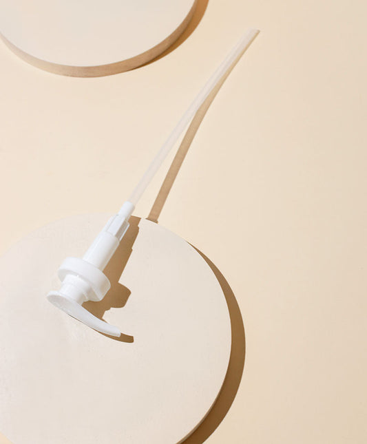 white gallon pump